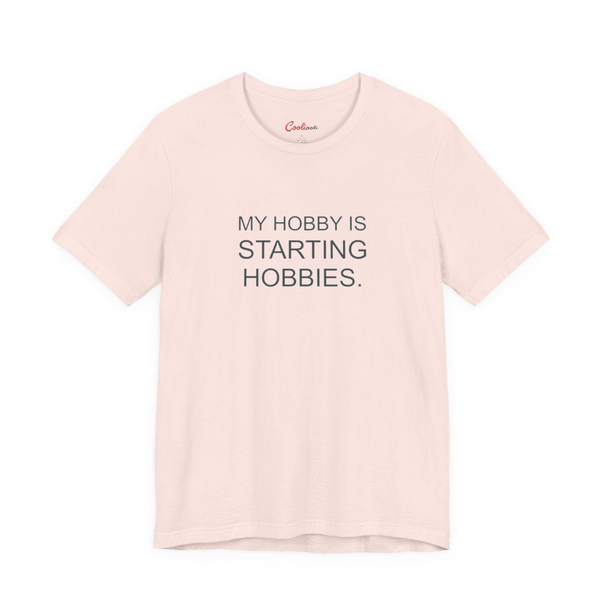 My Hobby Is Starting Hobbies Bella+Canvas3001 T-shirt in Soft Pink, full front supplier flat lay.