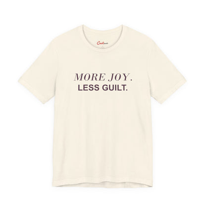 MORE JOY. LESS GUILT. — Natural Bella+Canvas 3001 full front flat lay