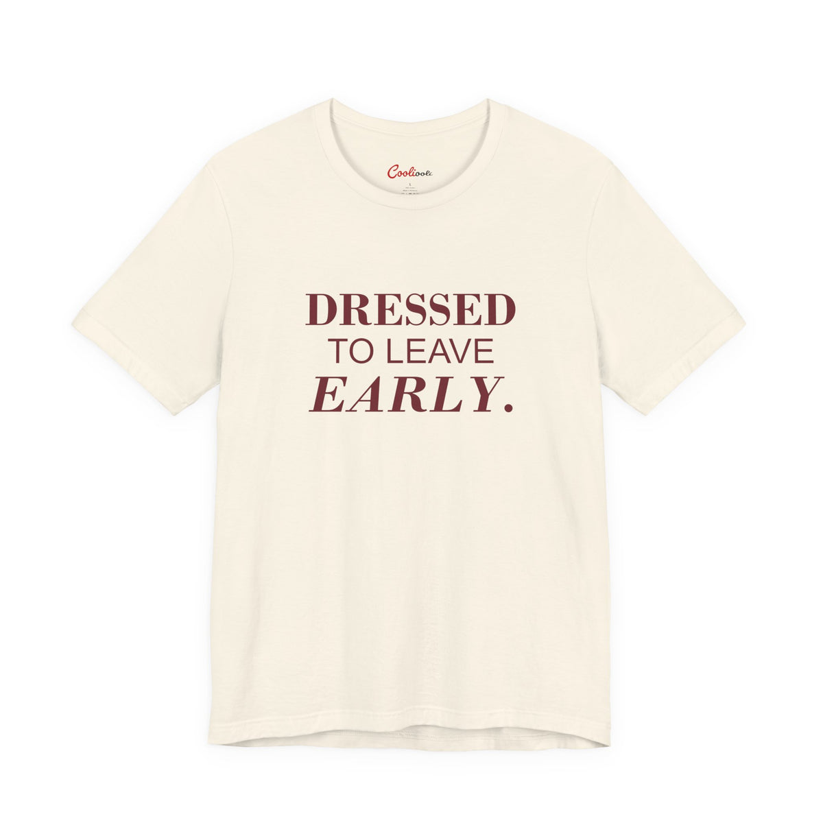 DRESSED TO LEAVE EARLY. on the Natural Bella+Canvas 3001 tee — accurate supplier front colour mockup