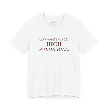 LOW MAINTENANCE. HIGH SALON BILL. on the White Bella+Canvas 3001 tee — accurate supplier front colour mockup