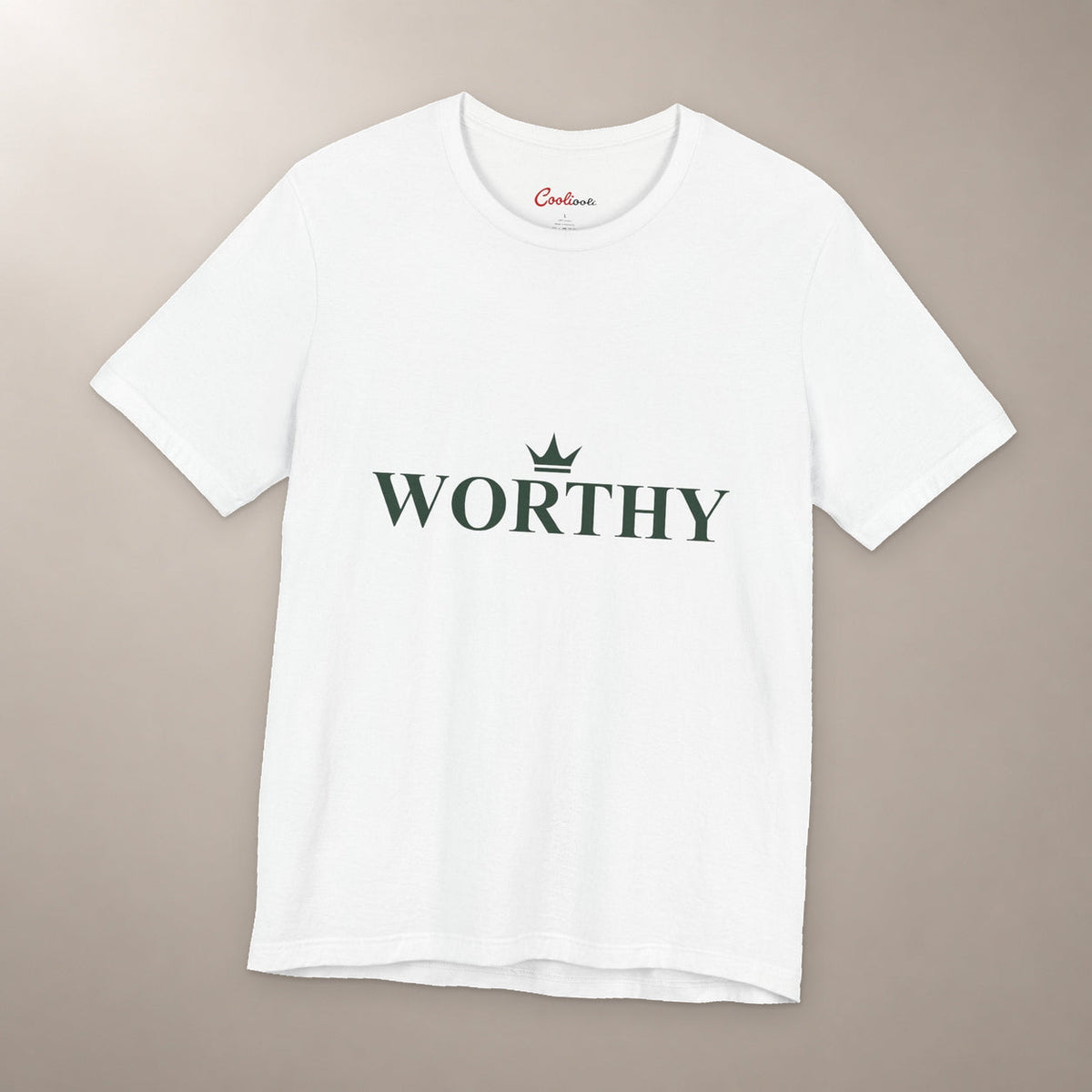 Her Worth Was Never in Question. Bella+Canvas 3001 T-shirt in White, front flat lay with Worthy lettering and a small crown on a plain warm neutral background.
