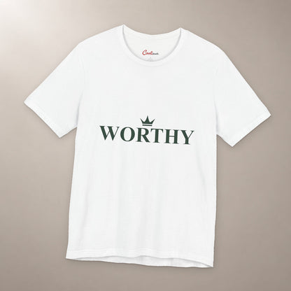 Her Worth Was Never in Question. Bella+Canvas 3001 T-shirt in White, front flat lay with Worthy lettering and a small crown on a plain warm neutral background.