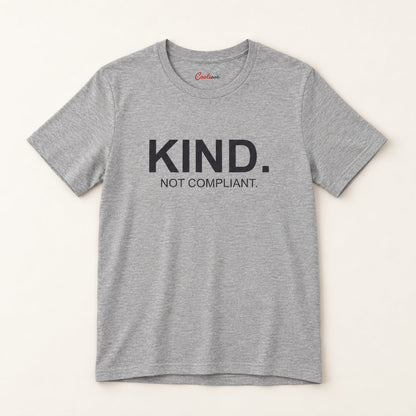 Kind. Not Compliant. affirmation tee in Athletic Heather on a neutral studio background