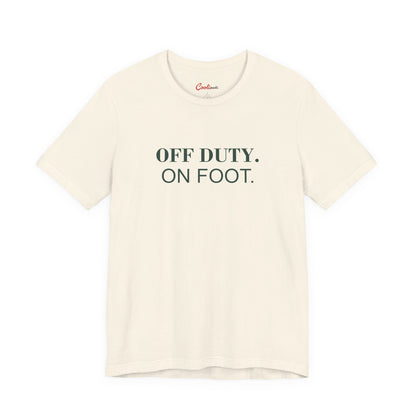 OFF DUTY. ON FOOT. on the Natural Bella+Canvas 3001 tee — accurate supplier front colour mockup