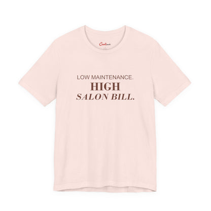 LOW MAINTENANCE. HIGH SALON BILL. on the Soft Pink Bella+Canvas 3001 tee — accurate supplier front colour mockup