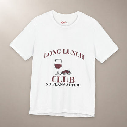 Lunch Is the Whole Agenda. Bella+Canvas 3001 T-shirt in White, front flat lay with Long Lunch Club, No Plans After. lettering with a wine glass and olive dish on a plain warm neutral background.
