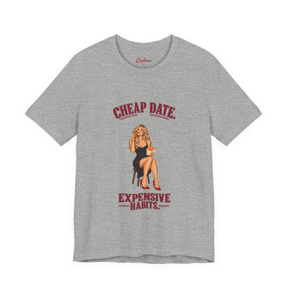 Cheap Date. Expensive Habits. Bella+Canvas 3001 T-shirt in Athletic Heather, front flat lay with burgundy lettering and black dress, red heels and chips illustration.