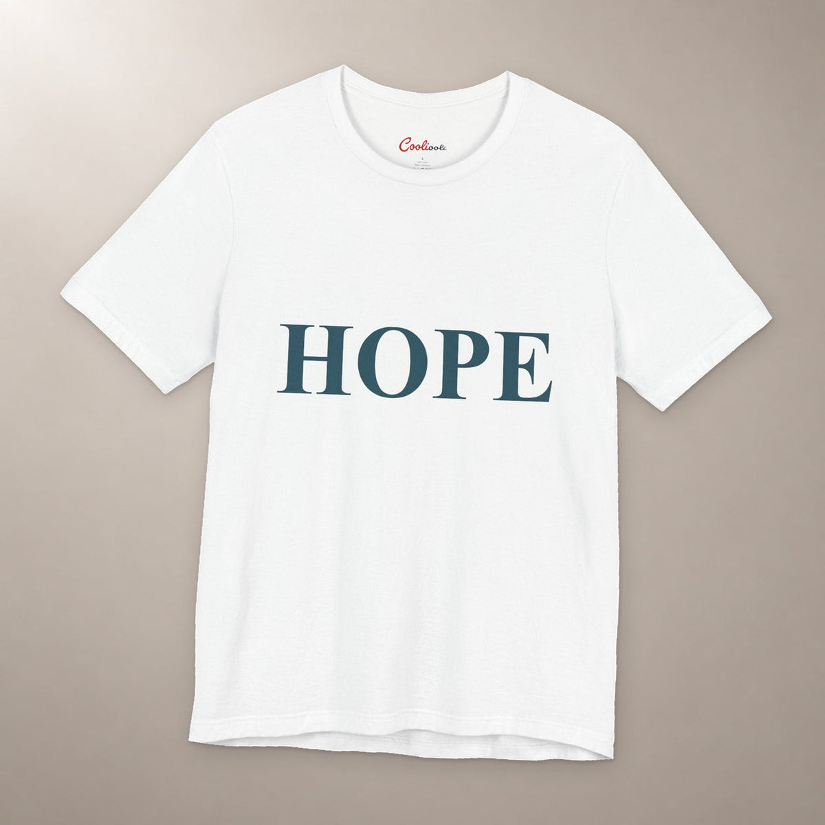 Better Days Look Good on You. Bella+Canvas 3001 T-shirt in White, front flat lay showing HOPE serif lettering on a plain warm neutral background.