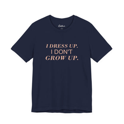 I DRESS UP. I DON'T GROW UP. — Navy Bella+Canvas 3001, accurate supplier front view
