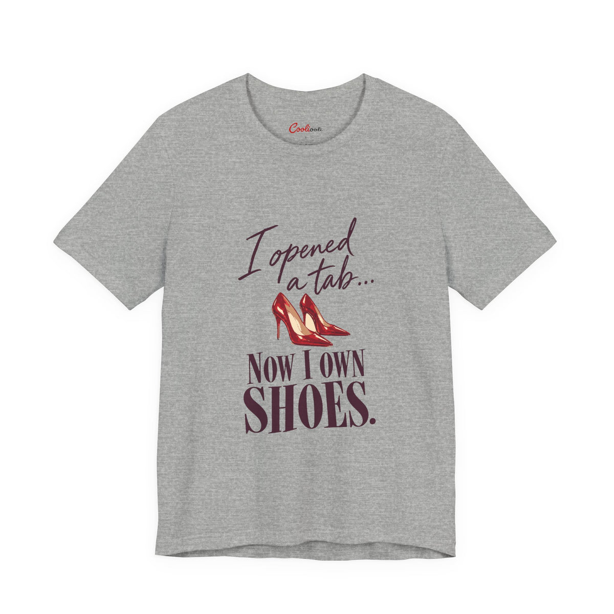 Athletic Heather Cooliooli T-shirt with red heels and “I opened a tab… Now I own shoes.” lettering, front flat lay