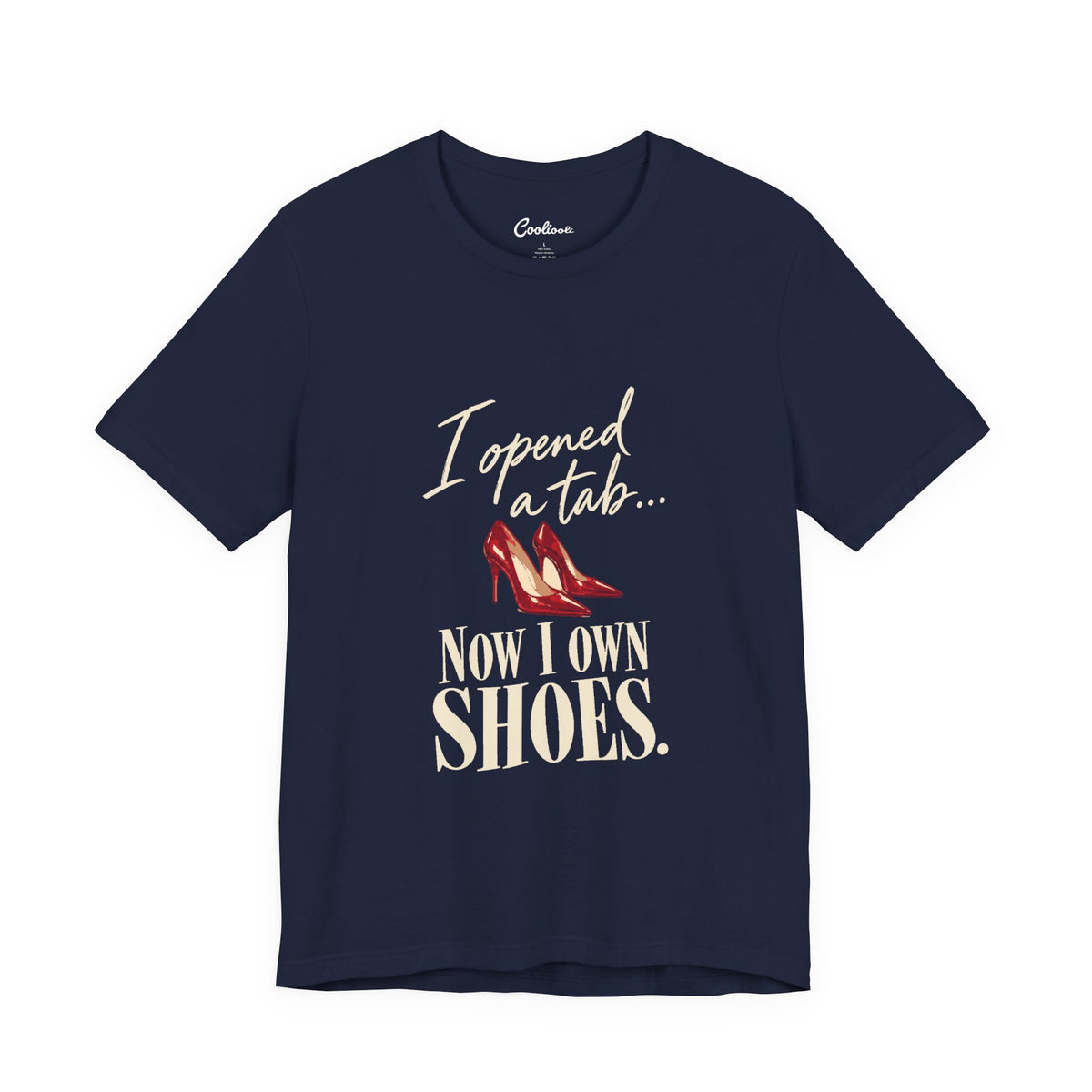 Navy Cooliooli T-shirt with red heels and “I opened a tab… Now I own shoes.” lettering, front flat lay