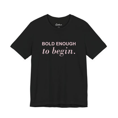 BOLD ENOUGH TO BEGIN. — Black Bella+Canvas 3001 full front flat lay