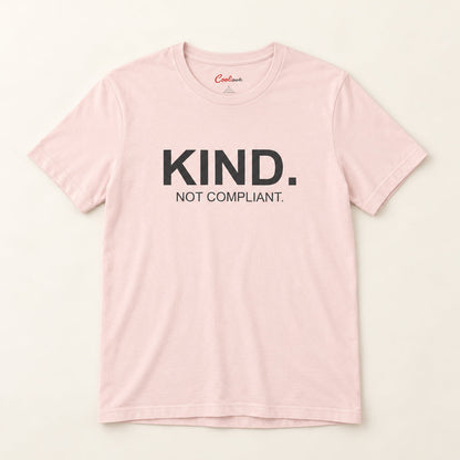 Kind. Not Compliant. affirmation tee in Soft Pink on a neutral studio background