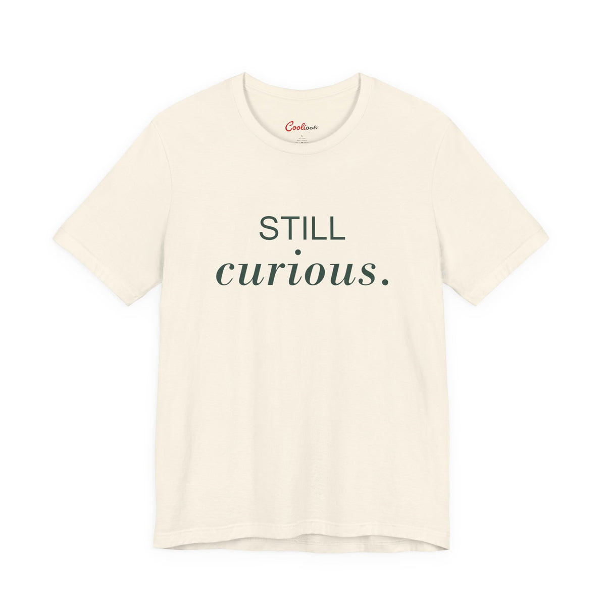 STILL CURIOUS. — Natural Bella+Canvas 3001 full front flat lay