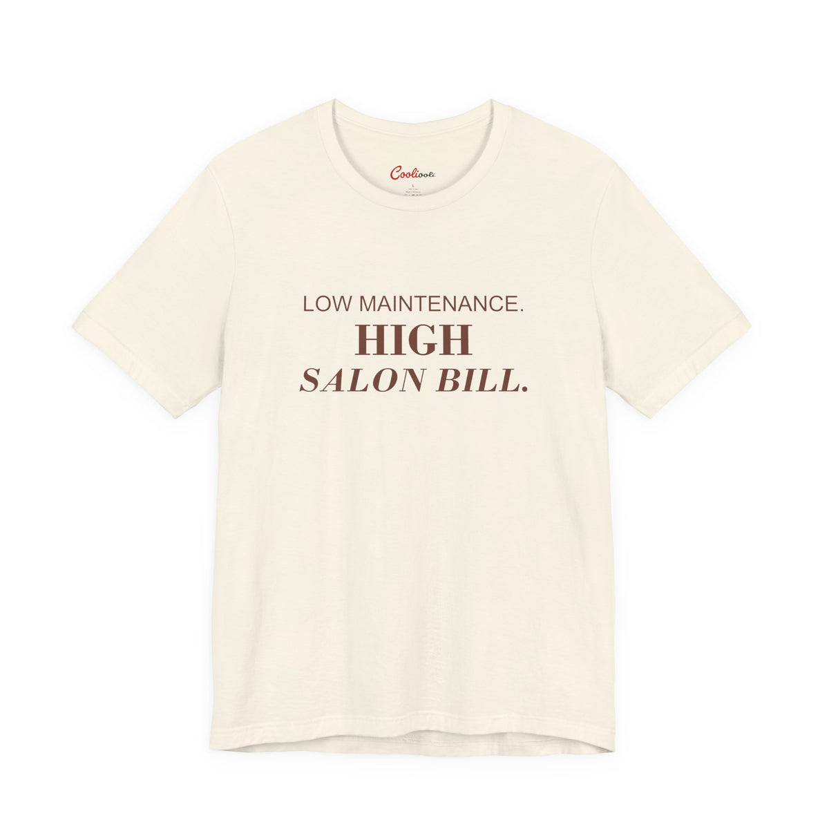 LOW MAINTENANCE. HIGH SALON BILL. on the Natural Bella+Canvas 3001 tee — accurate supplier front colour mockup