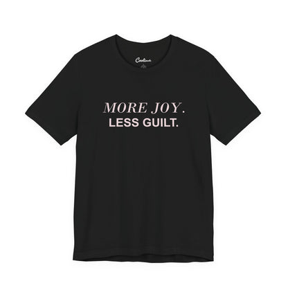 MORE JOY. LESS GUILT. — Black Bella+Canvas 3001 full front flat lay