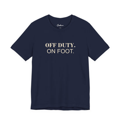 OFF DUTY. ON FOOT. on the Navy Bella+Canvas 3001 tee — accurate supplier front colour mockup