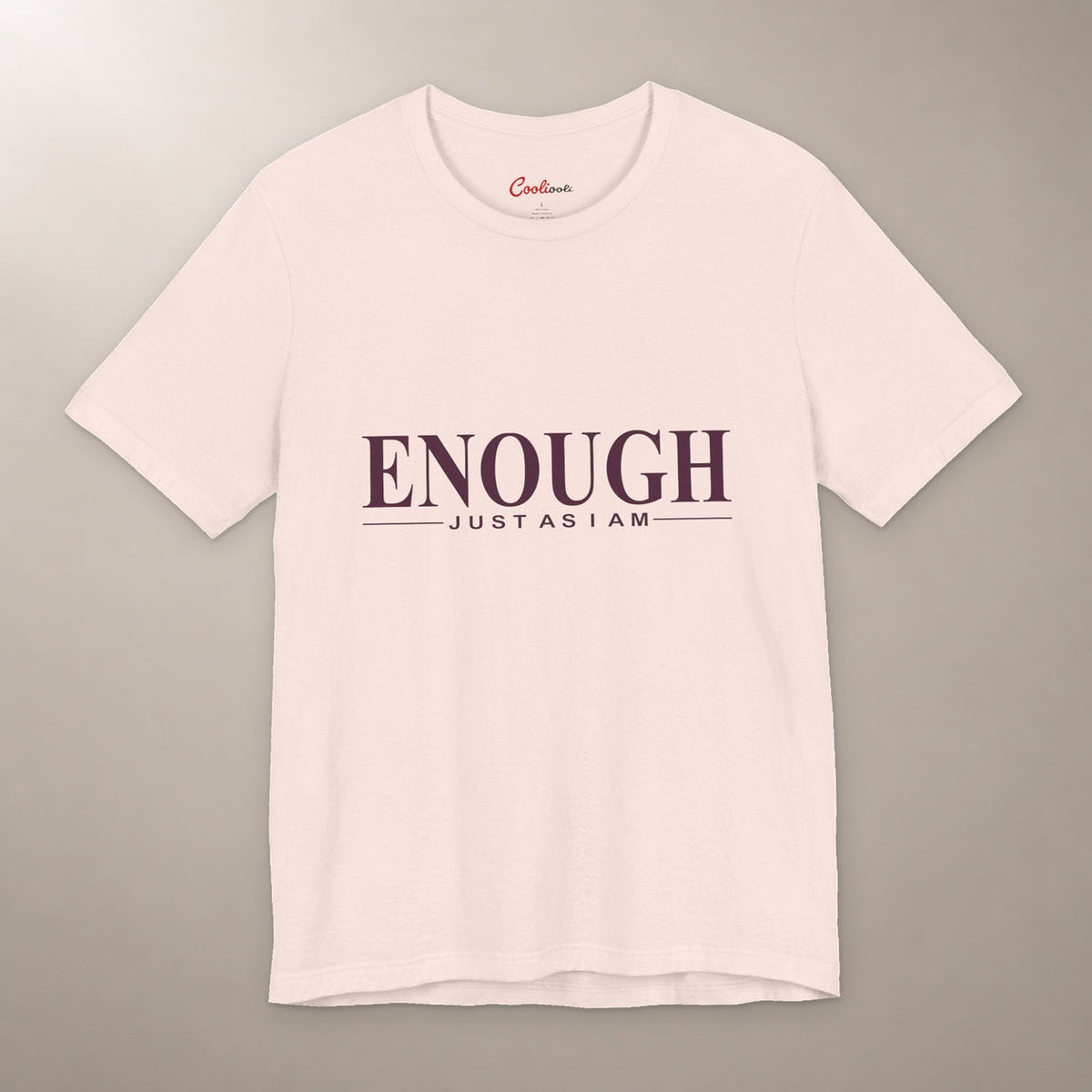 Nothing to Prove. Bella+Canvas 3001 T-shirt in Soft Pink, front flat lay with Enough / Just as I am lettering on a plain warm neutral background.