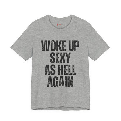 Woke Up Sexy As Hell Again funny t-shirt flat lay in a heather colourway, statement gift tee