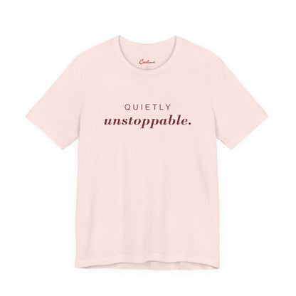 Quietly Unstoppable affirmation tee in Soft Pink; supplier front view showing print placement.