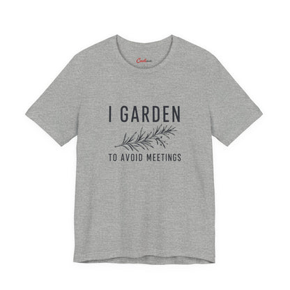 I Garden To Avoid Meetings funny t-shirt flat lay in a heather colourway, introvert and gardening gift tee