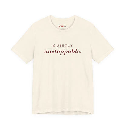 Quietly Unstoppable affirmation tee in Natural; supplier front view showing print placement.