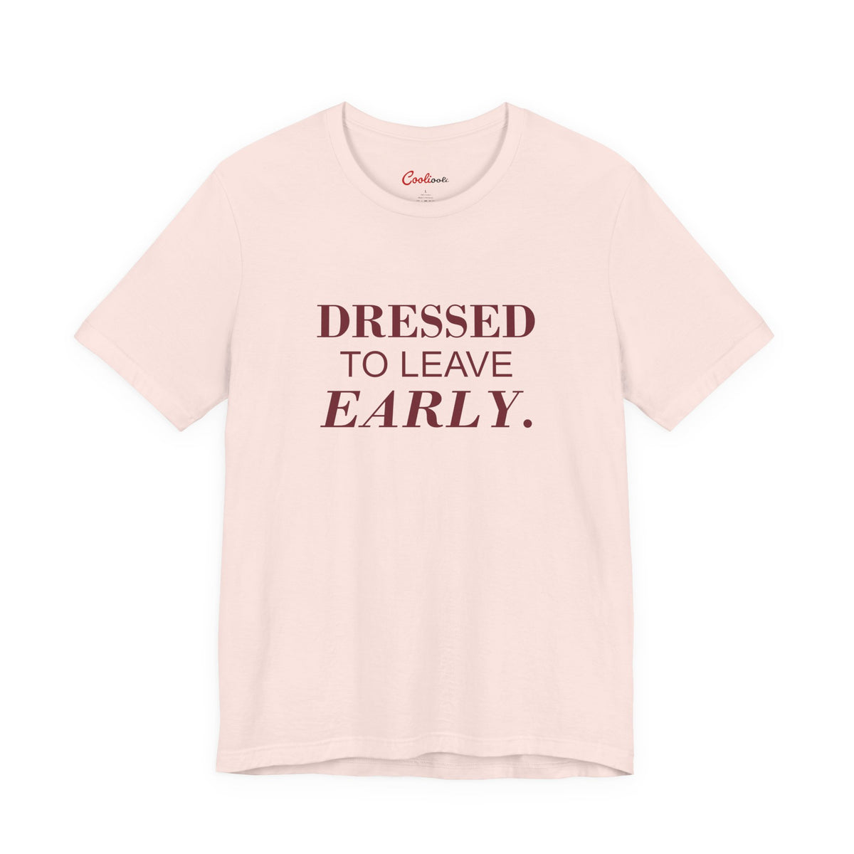 DRESSED TO LEAVE EARLY. on the Soft Pink Bella+Canvas 3001 tee — accurate supplier front colour mockup