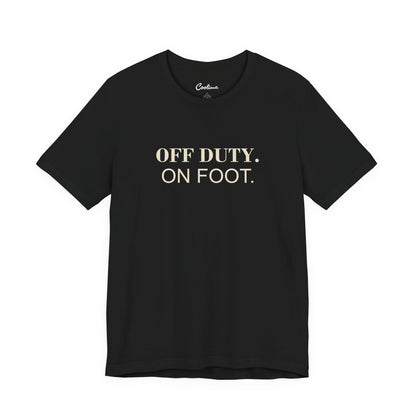 OFF DUTY. ON FOOT. on the Black Bella+Canvas 3001 tee — accurate supplier front colour mockup