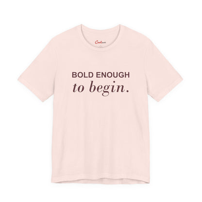 BOLD ENOUGH TO BEGIN. — Soft Pink Bella+Canvas 3001 full front flat lay