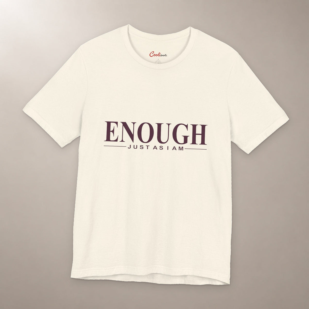 Nothing to Prove. Bella+Canvas 3001 T-shirt in Natural, front flat lay with Enough / Just as I am lettering on a plain warm neutral background.