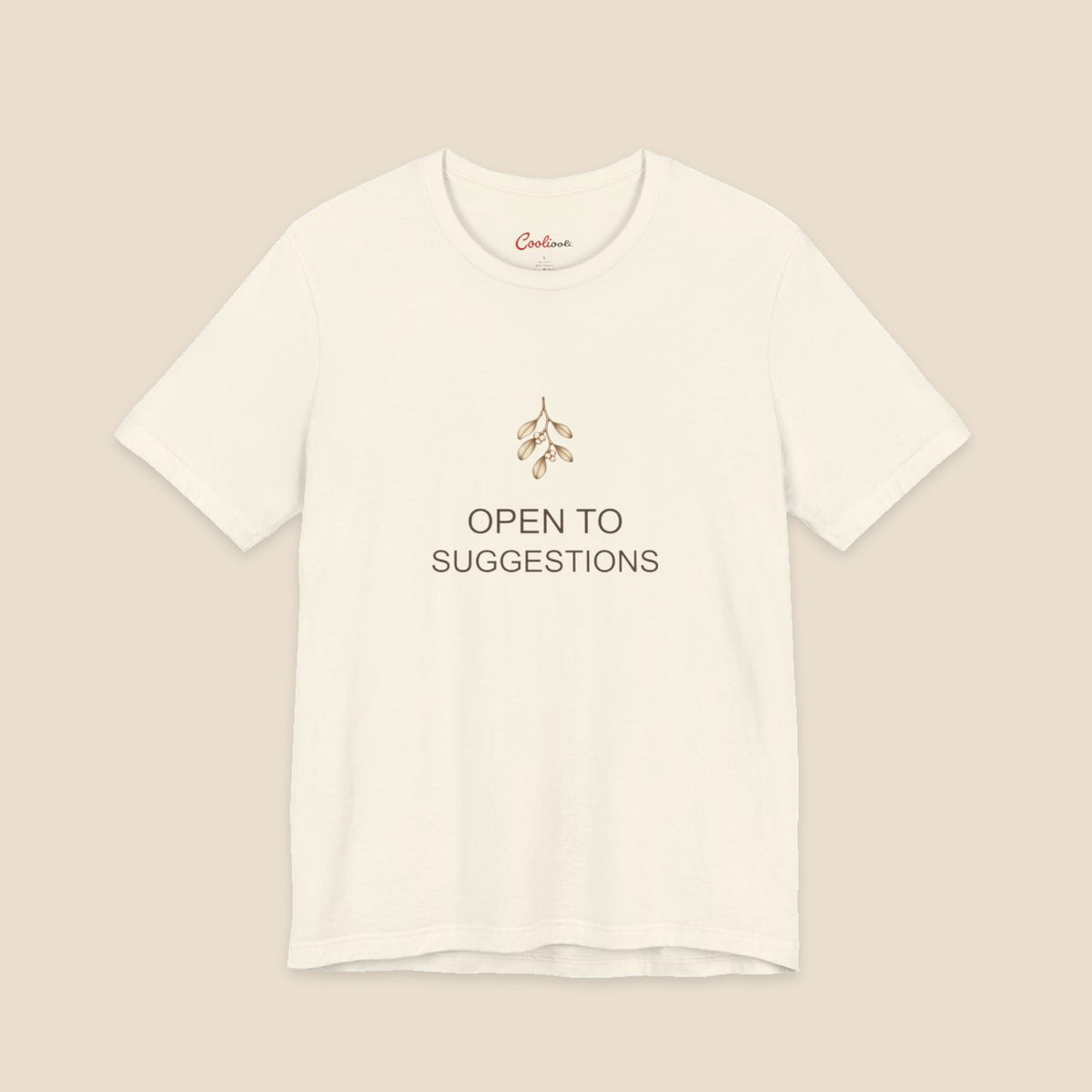 Natural Bella+Canvas3001 Christmas T-shirt with a small bronze and cream mistletoe graphic and Open to Suggestions lettering.