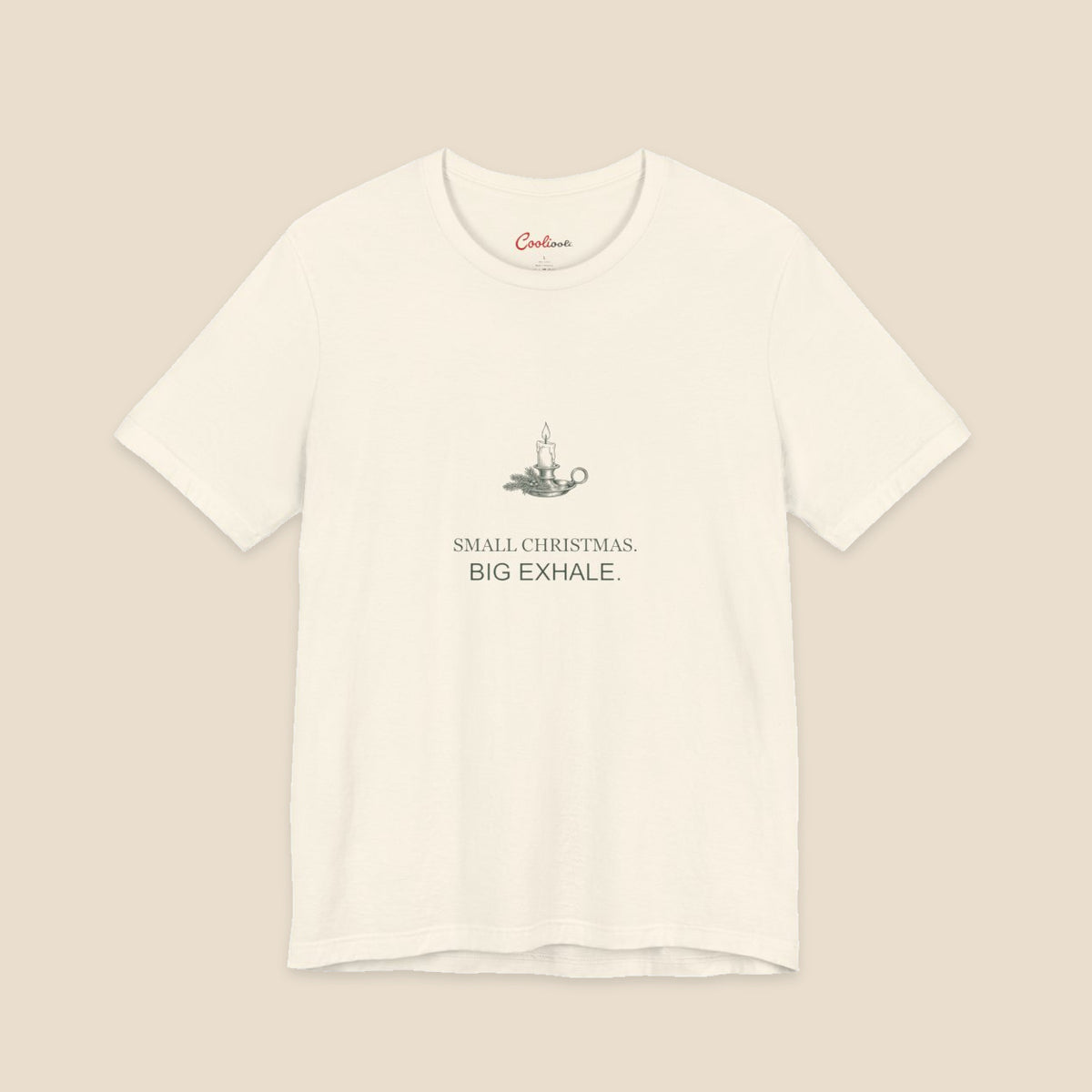 Small Christmas Big Exhale candle graphic on a Natural Bella+Canvas 3001 unisex tee; front colour preview.