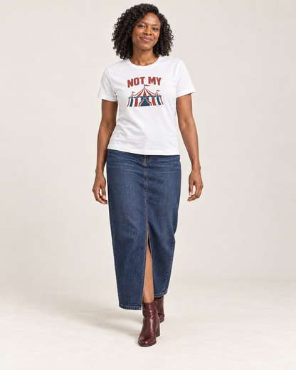 Amara wearing the White NOT MY circus tent Bella+Canvas6400 women’s relaxed-fit tee with a denim maxi skirt and oxblood ankle boots in a pale studio.
