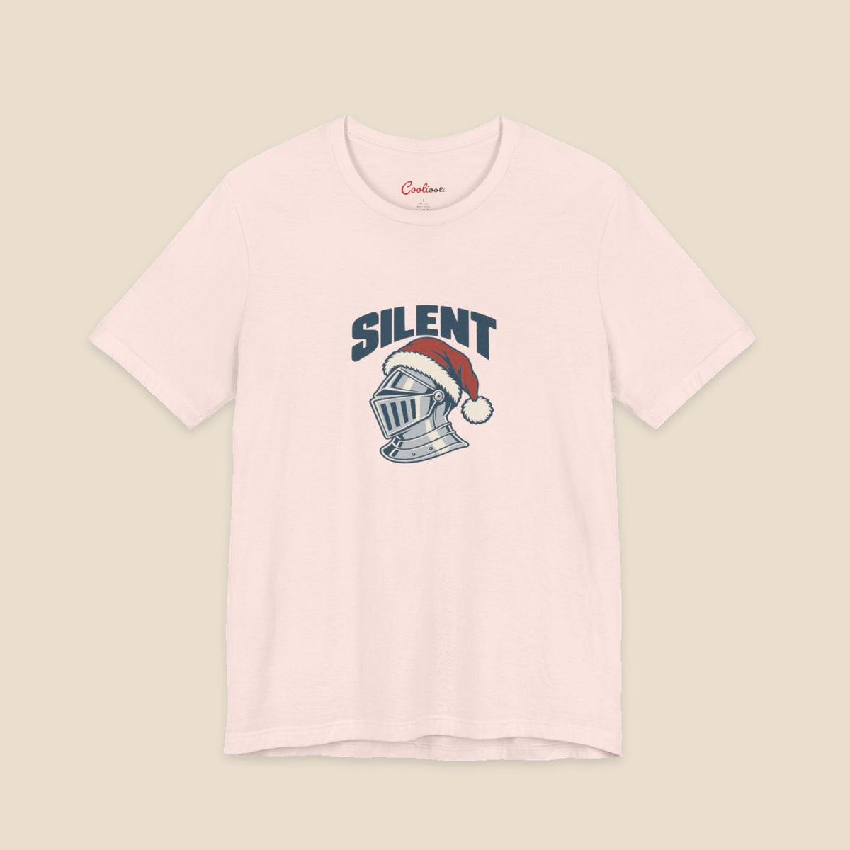 SILENT and original silver-grey knight helmet in a red Santa hat on the Soft Pink Bella+Canvas 3001 unisex tee; front colour preview.