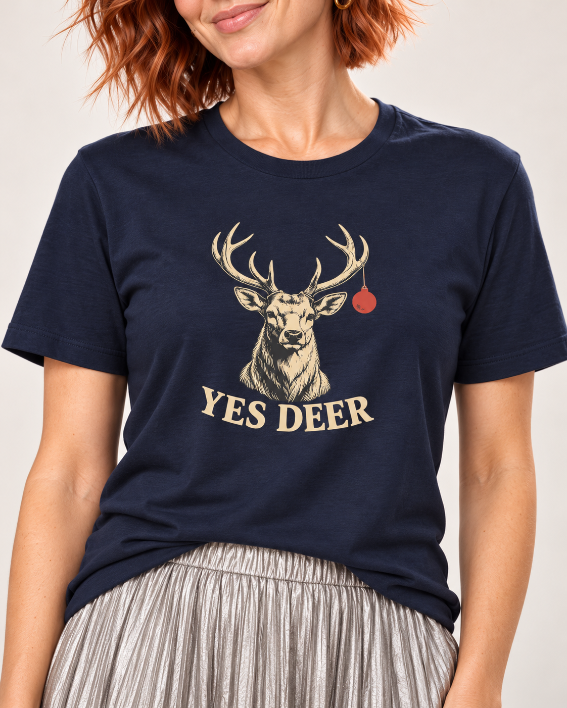 Matching collar-to-hip detail of the plain Navy Bella+Canvas 3001 unisex tee with stag, one red bauble and curved YES DEER lettering.