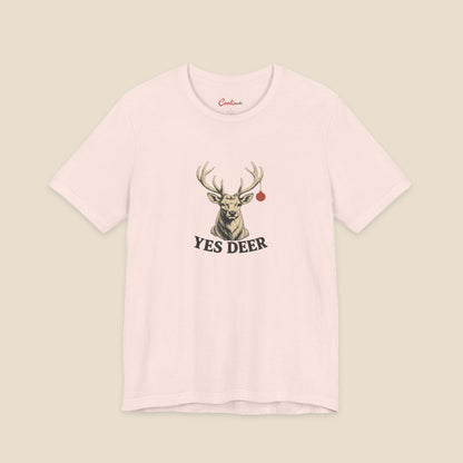 YES DEER stag and one red bauble on the Soft Pink Bella+Canvas 3001 unisex tee; front colour preview.
