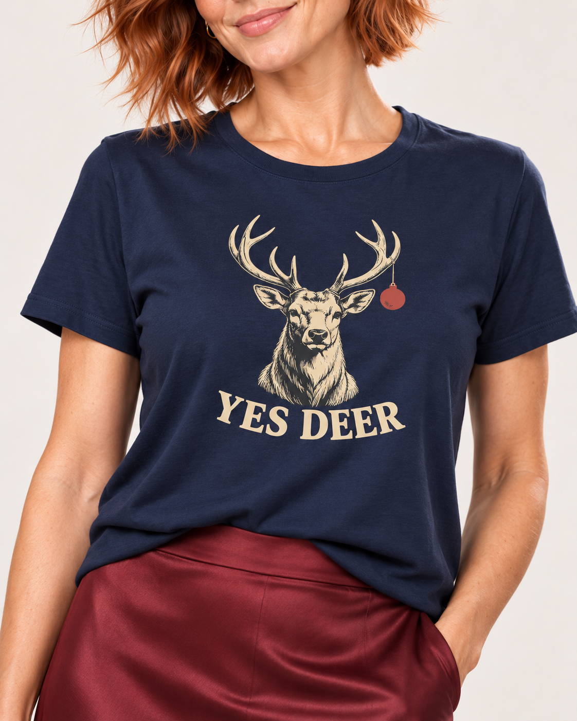 Matching collar-to-hip detail of Navy Bella+Canvas 6400 women’s relaxed-fit tee with original stag, one red bauble and curved YES DEER lettering.