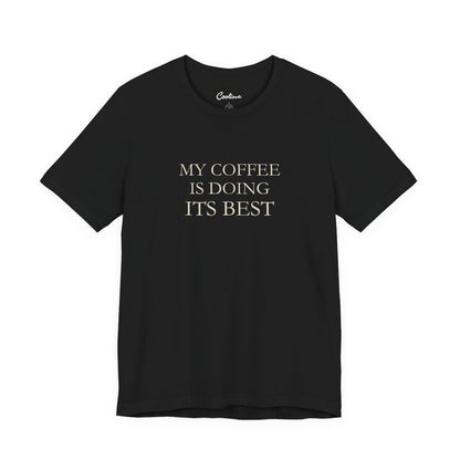My Coffee Is Doing Its Best Bella+Canvas3001 T-shirt in Black, full front supplier flat lay.