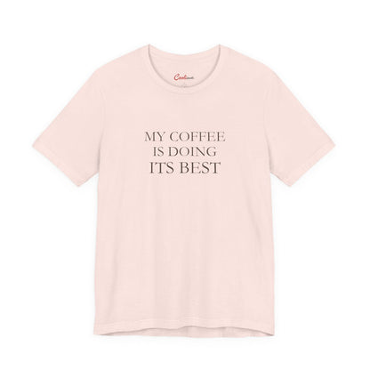 My Coffee Is Doing Its Best Bella+Canvas3001 T-shirt in Soft Pink, full front supplier flat lay.