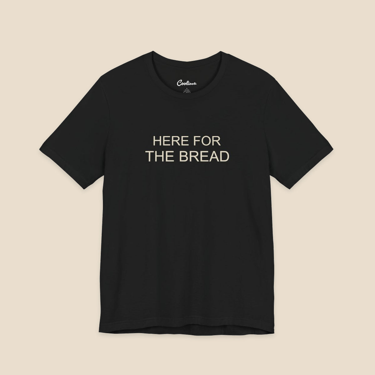 Black Bella+Canvas3001 T-shirt with the Here for the Bread two-line chest design.