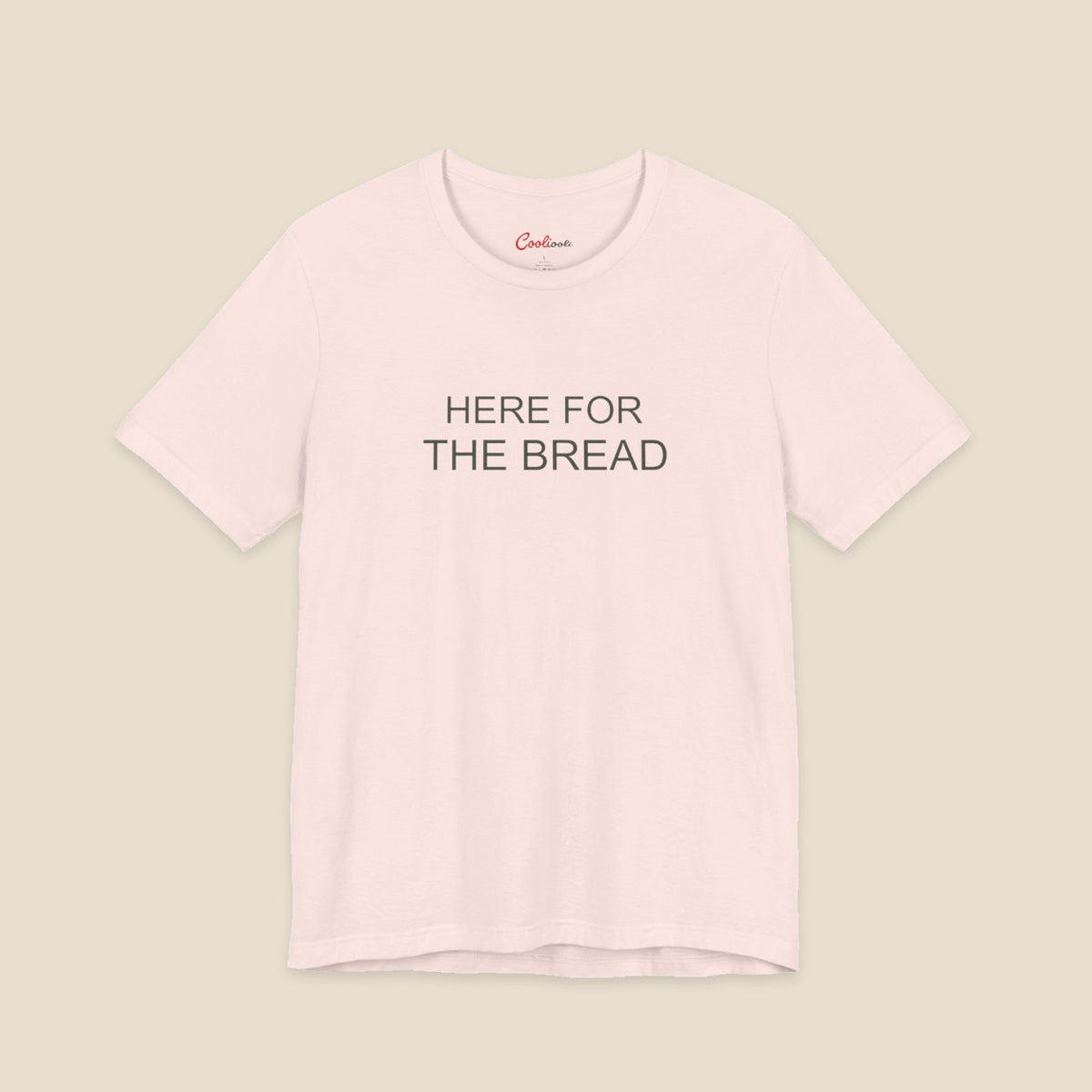 Soft Pink Bella+Canvas3001 T-shirt with the Here for the Bread two-line chest design.