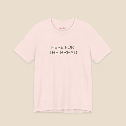 Soft Pink Bella+Canvas3001 T-shirt with the Here for the Bread two-line chest design.