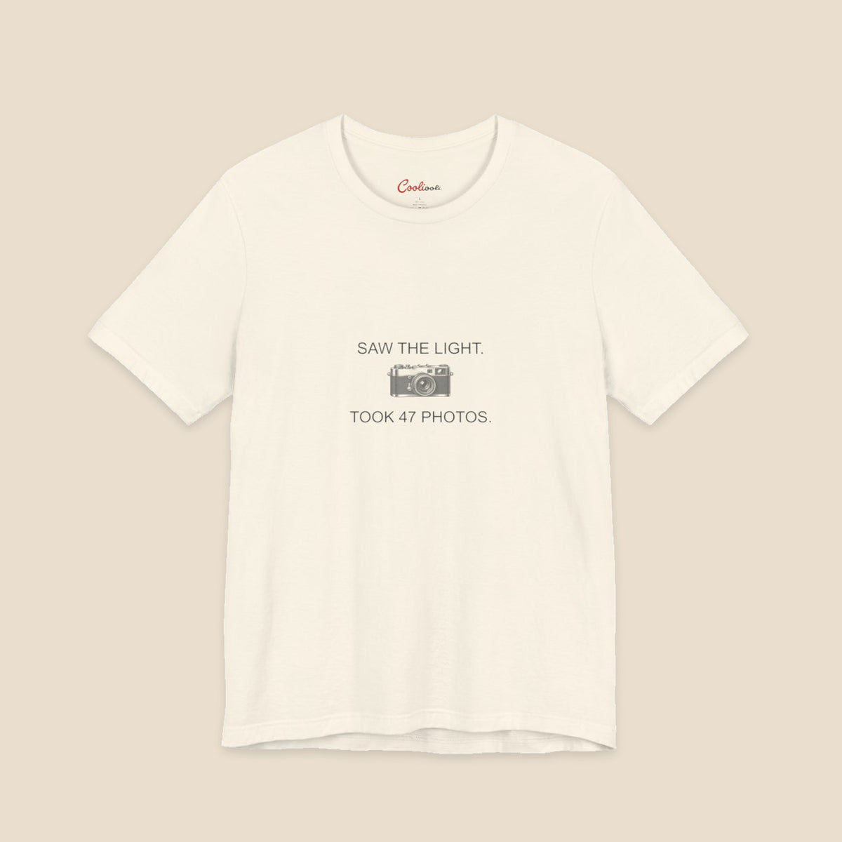 Saw the Light Took 47 Photos original camera graphic on the Natural Bella+Canvas3001 unisex tee; front colour preview.