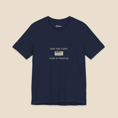 Saw the Light Took 47 Photos original camera graphic on the Navy Bella+Canvas3001 unisex tee; front colour preview.