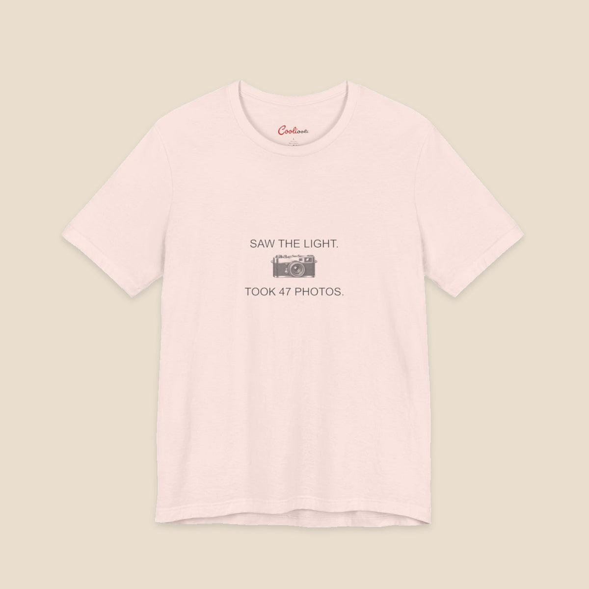 Saw the Light Took 47 Photos original camera graphic on the Soft Pink Bella+Canvas3001 unisex tee; front colour preview.