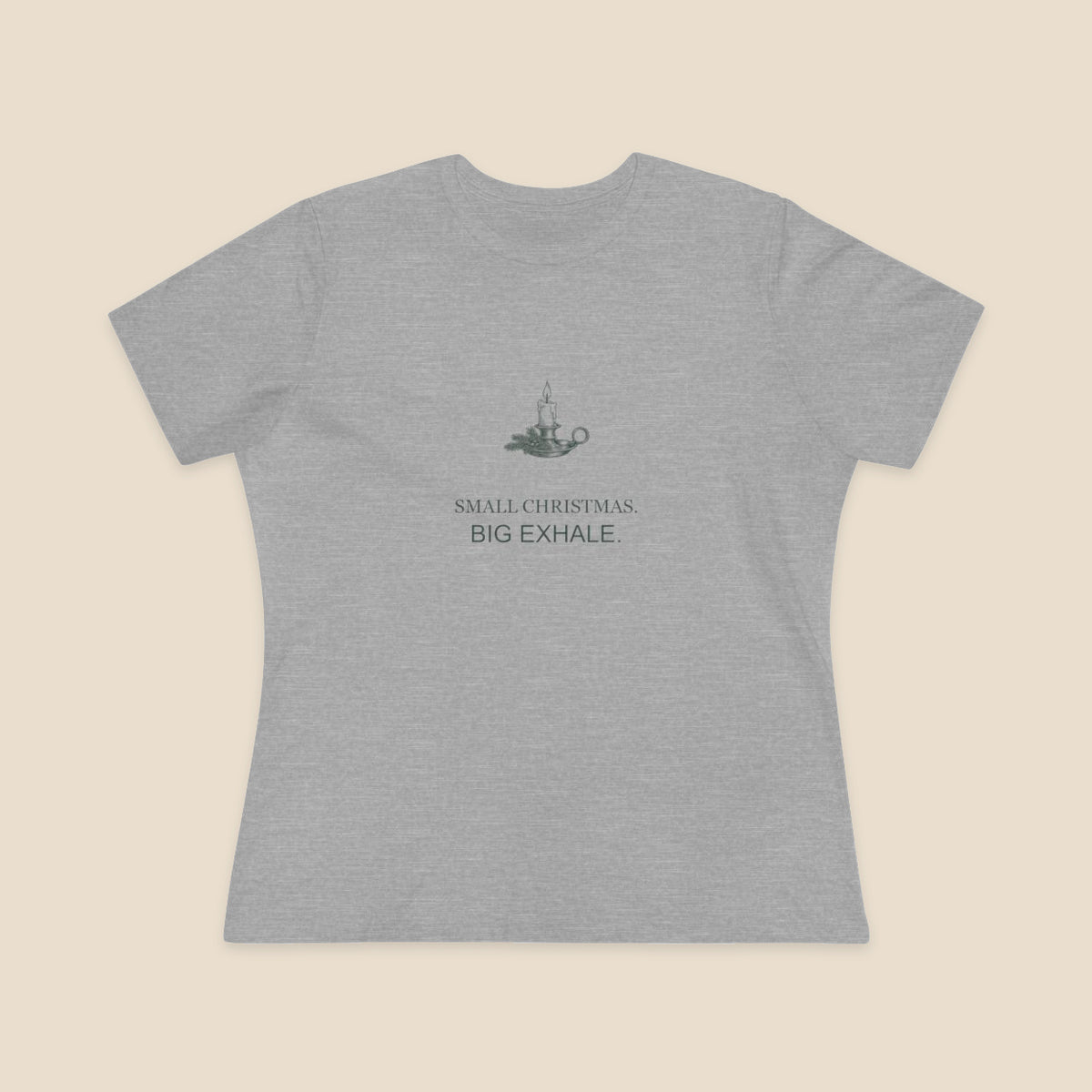 Small Christmas Big Exhale candle graphic on an Athletic Heather Bella+Canvas 6400 women’s relaxed-fit tee; front colour preview.