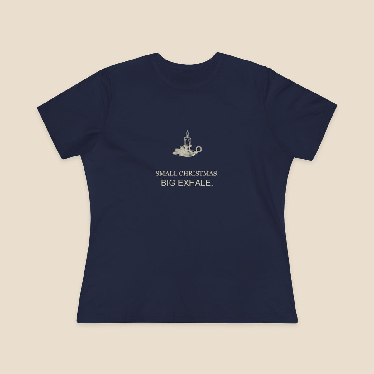 Small Christmas Big Exhale candle graphic on a Navy Bella+Canvas 6400 women’s relaxed-fit tee; front colour preview.