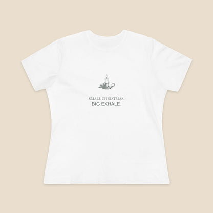 Small Christmas Big Exhale candle graphic on a White Bella+Canvas 6400 women’s relaxed-fit tee; front colour preview.