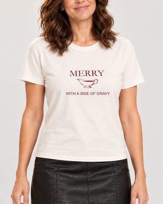 Collar-to-hip detail of the Natural Bella+Canvas6400 women’s relaxed-fit tee, showing Merry With a Side of Gravy lettering and the original gravy boat graphic.