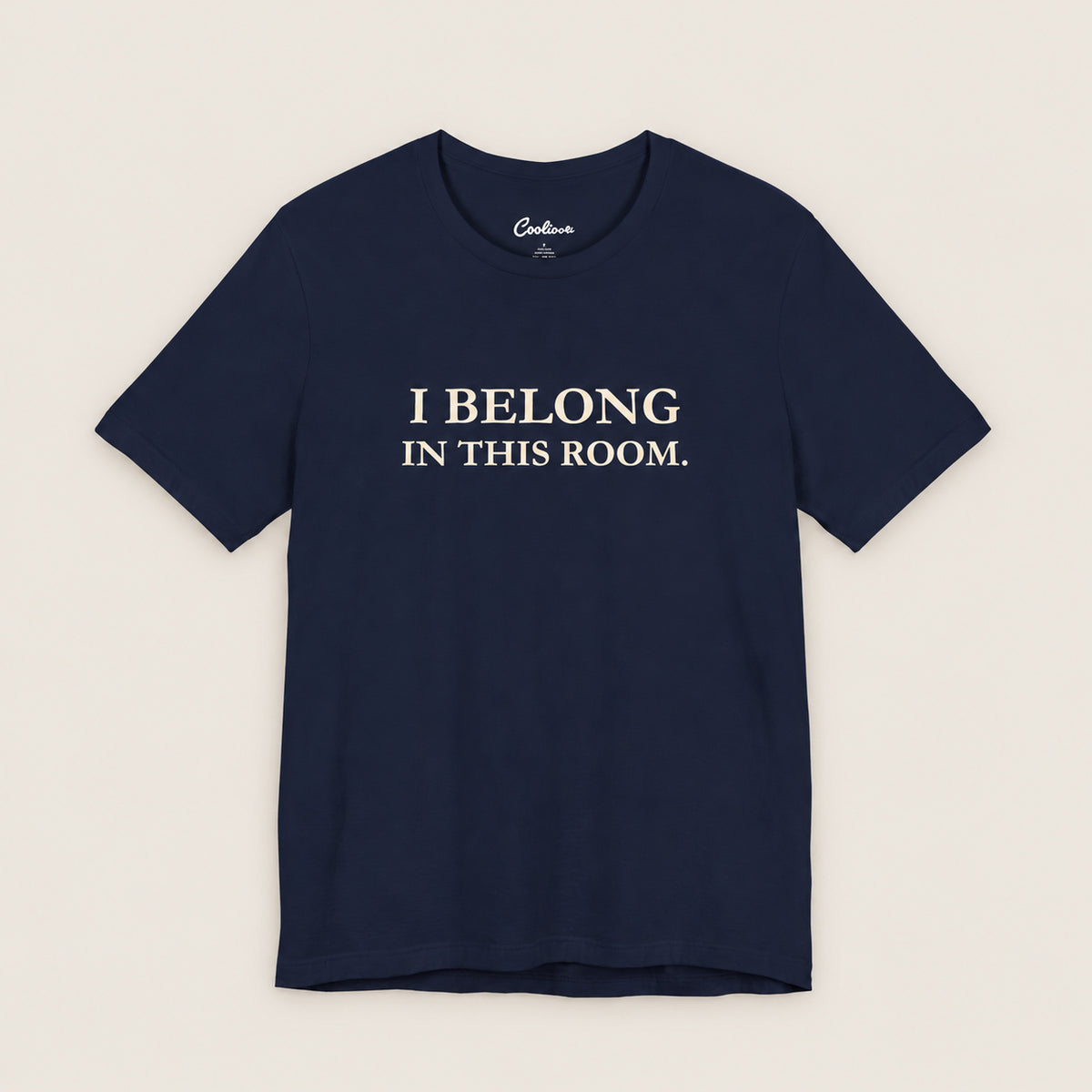 I BELONG IN THIS ROOM. Bella+Canvas3001 T-shirt in Navy, front flat lay.